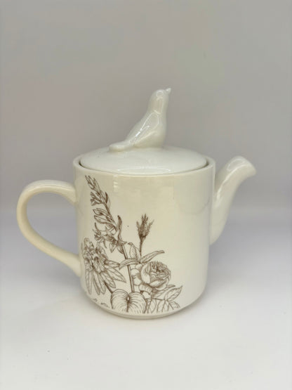 RHS-inspired ceramic teapot with floral and bird design