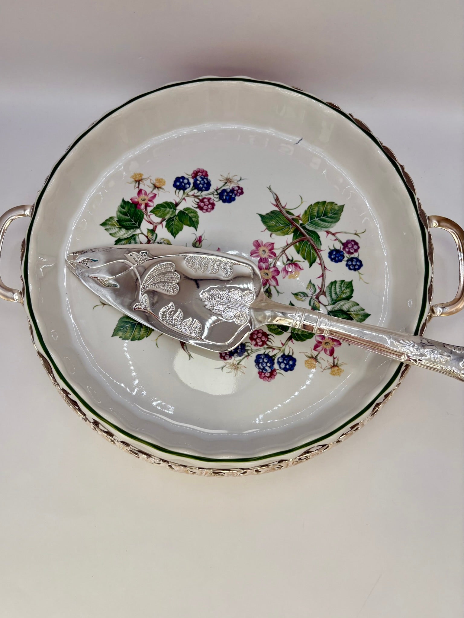 Vintage H. Samuel ceramic flan dish with ornate silver-plated holder and serving spatula