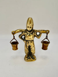 Vintage brass figurine of a boy carrying water buckets, rustic art deco home decor