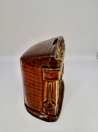 Studio Szeiler glazed ceramic fireplace money box with “There's No Place Like Home” inscription