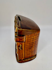 Studio Szeiler glazed ceramic fireplace money box with “There's No Place Like Home” inscription