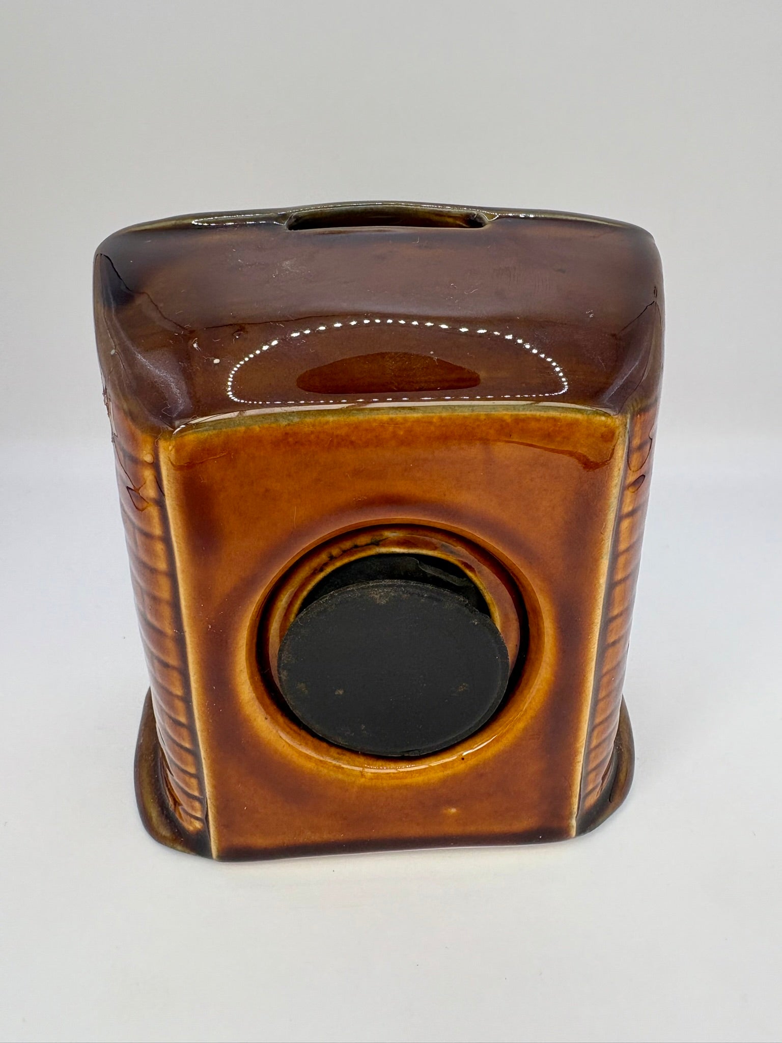 Studio Szeiler glazed ceramic fireplace money box with “There's No Place Like Home” inscription