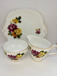 Royal Windsor fine bone china tea set with bright pink and yellow rose bouquets, vintage English porcelain