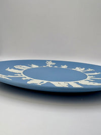 Blue Wedgwood Jasperware plate with neoclassical white relief detail