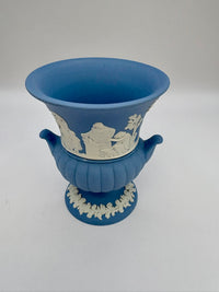Vintage urn-shaped Wedgwood blue jasperware vase with applied white relief scenes and footed base