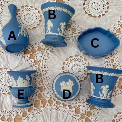 Collection of blue ceramic items with white patterns on