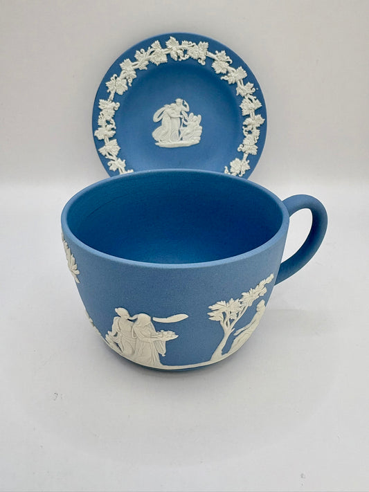 Wedgwood blue jasperware teacup and saucer with Roman cameo design