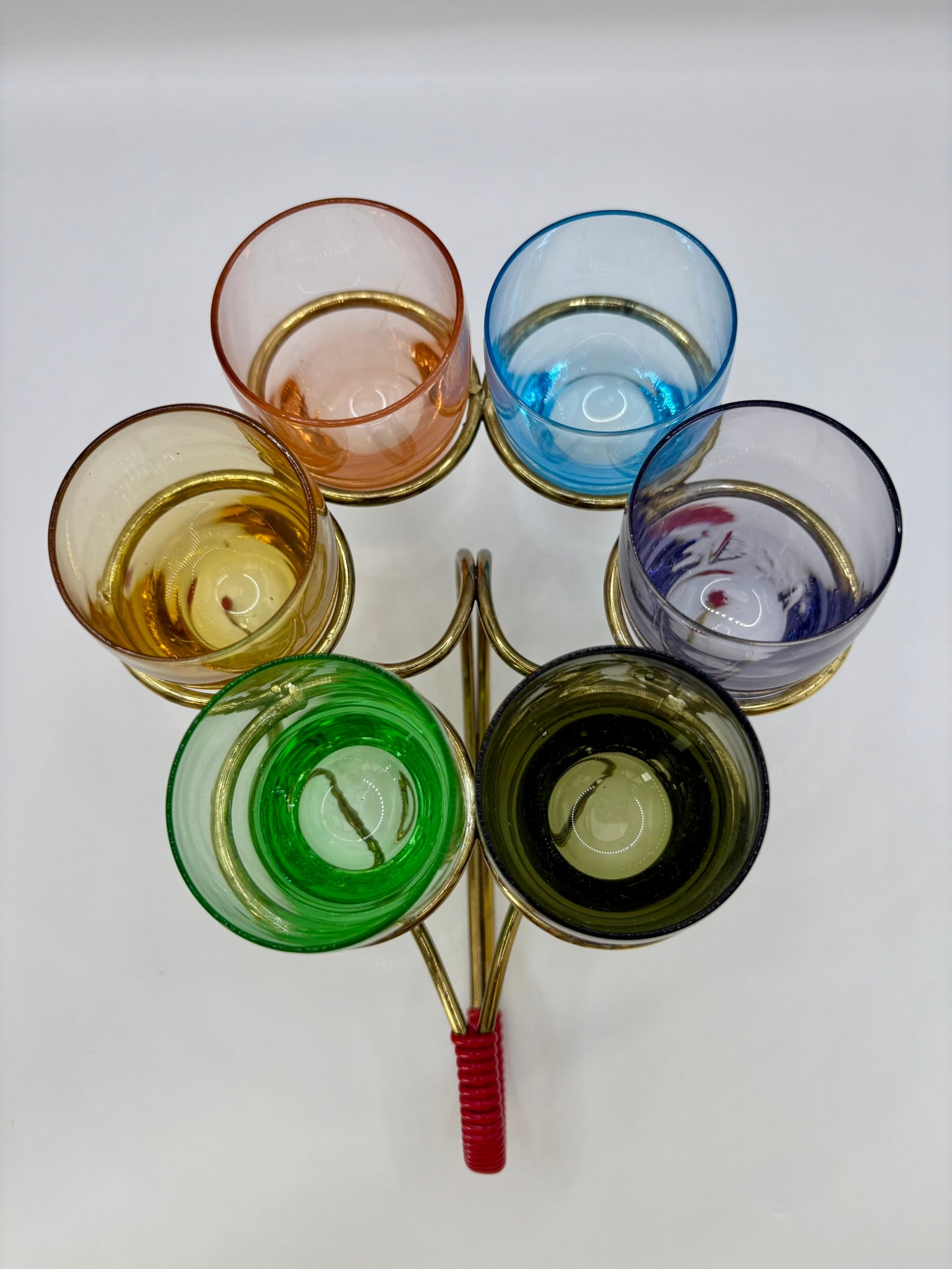 Set of six vintage shot glasses with original 1960s metal cradle