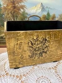 Vintage embossed brass magazine rack featuring a 1960s tavern scene
