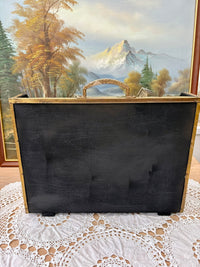 Vintage embossed brass magazine rack featuring a 1960s tavern scene