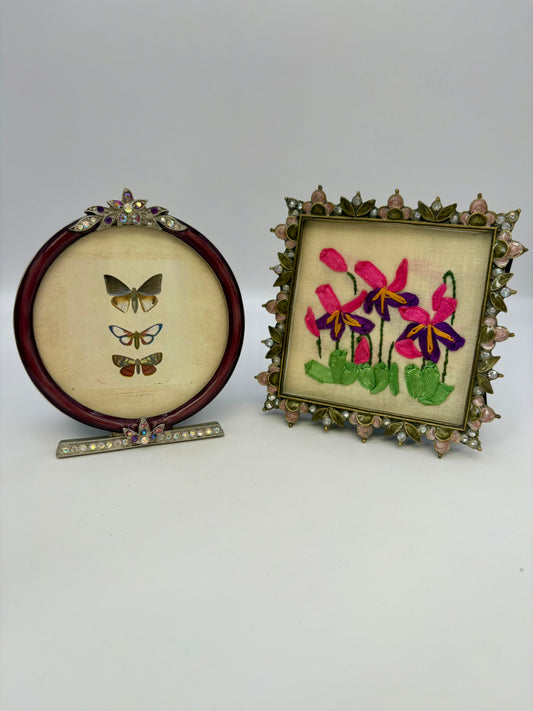 Two framed artworks on a white background