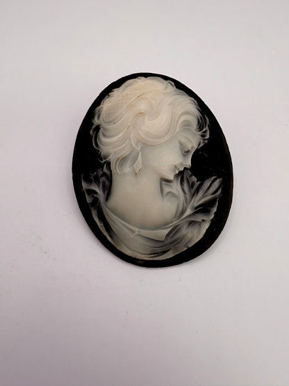 Cameo with a woman's profile on a white background