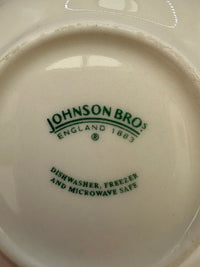 Johnson Bros. logo on a white dish with green text