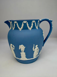 Vintage 1954 Wedgwood blue and white jasperware pitcher with neoclassical design
