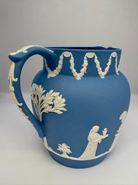 Vintage 1954 Wedgwood blue and white jasperware pitcher with neoclassical design
