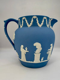 Vintage 1954 Wedgwood blue and white jasperware pitcher with neoclassical design