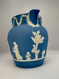 Vintage 1954 Wedgwood blue and white jasperware pitcher with neoclassical design