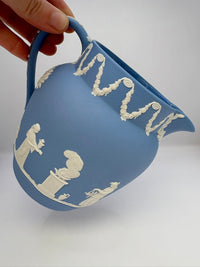 Vintage 1954 Wedgwood blue and white jasperware pitcher with neoclassical design