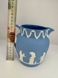 Vintage 1954 Wedgwood blue and white jasperware pitcher with neoclassical design