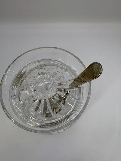 Clear glass bowl with decorative interior design on a white background