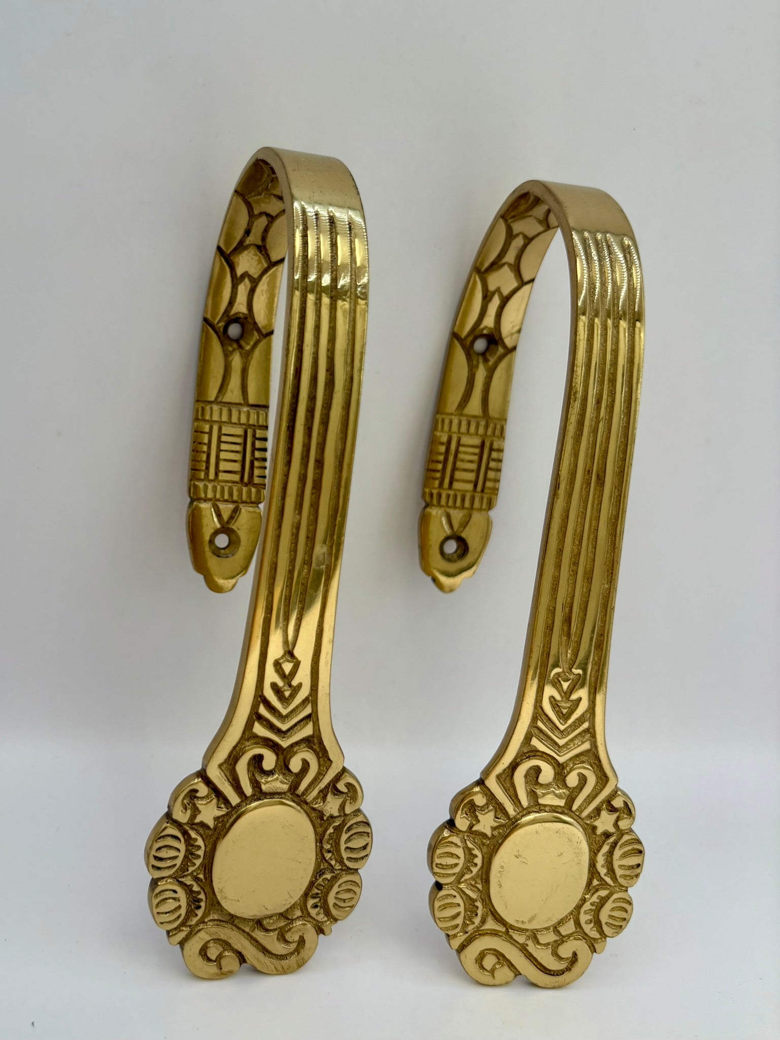 Solid brass curtain hardware set with vintage-style rods and finials