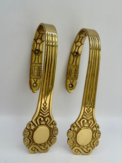 Solid brass curtain hardware set with vintage-style rods and finials