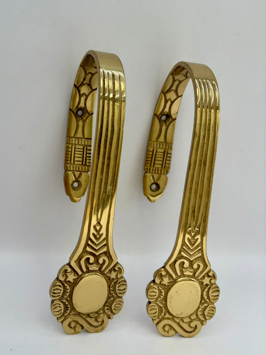 Solid brass curtain hardware set with vintage-style rods and finials