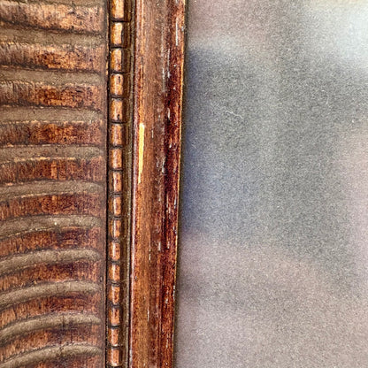 Close-up of a textured wooden surface with a ribbed pattern