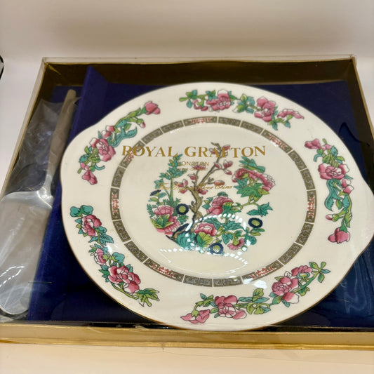 Decorative plate with floral design and 'Royal Grafton' branding in a box