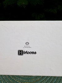 White box with 'Royal Ashmore Heirlooms' branding on a dark background