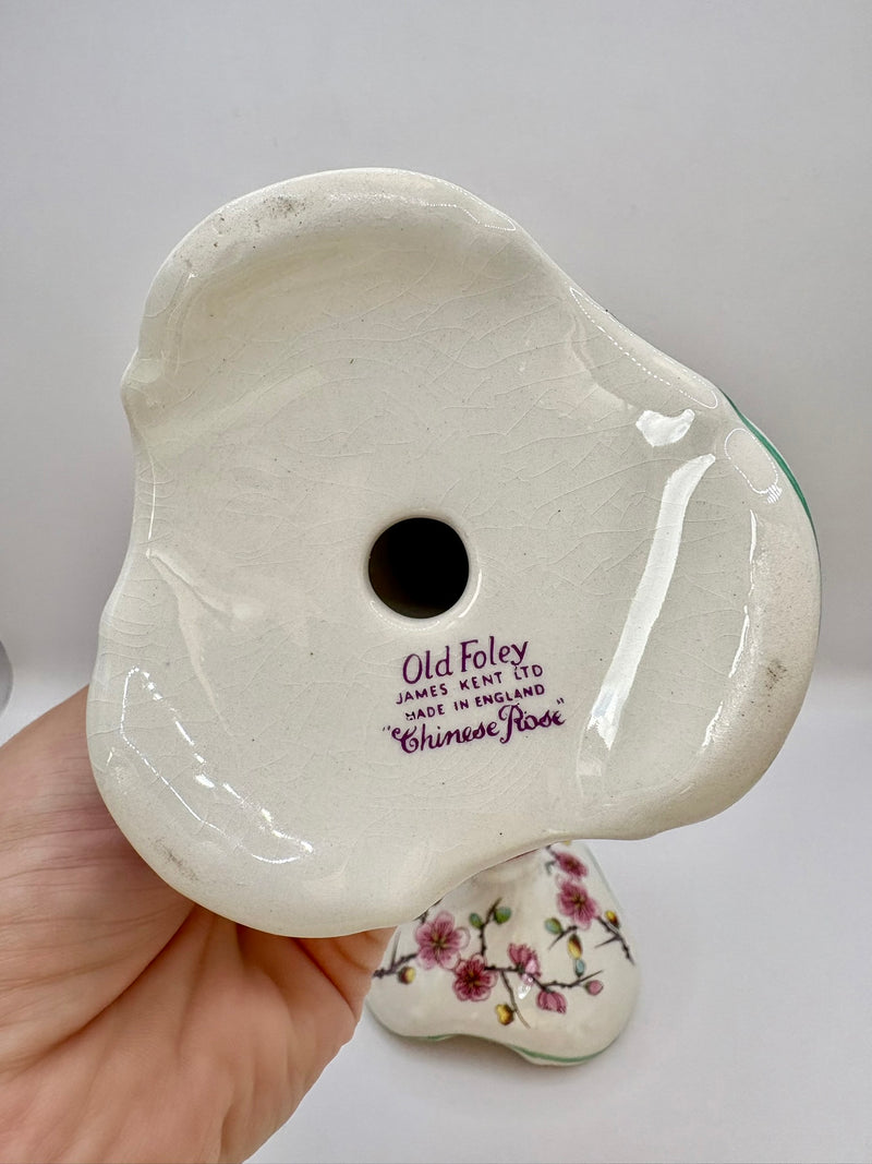 Ceramic product with floral design on a plain background