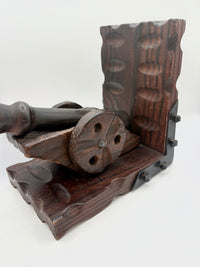 Pair of vintage wooden cannon bookends with metal brackets for bookshelf decor