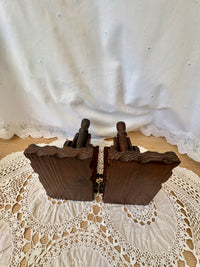 Pair of vintage wooden cannon bookends with metal brackets for bookshelf decor