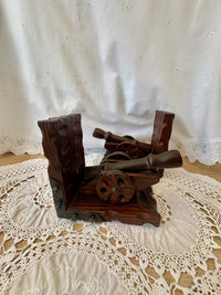 Pair of vintage wooden cannon bookends with metal brackets for bookshelf decor