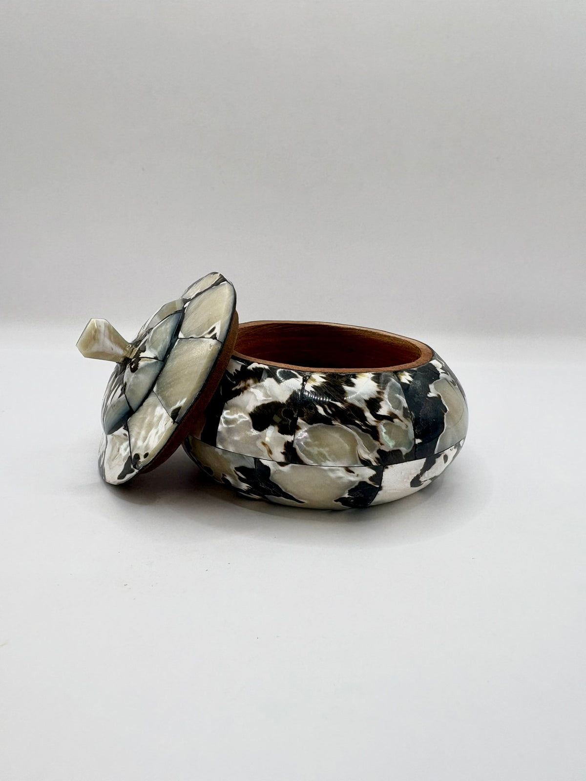 Marble-patterned jewelry box with a lid on a white background