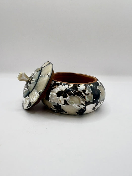 Marble-patterned jewelry box with a lid on a white background