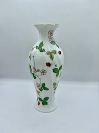 White vase with floral patterns on a white background