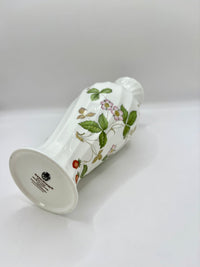 Vase with floral design on a white background