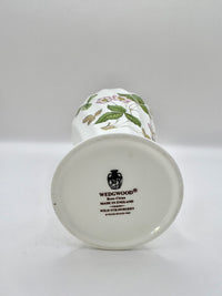 Ceramic vase with floral design on a white background, featuring Wedgwood branding.