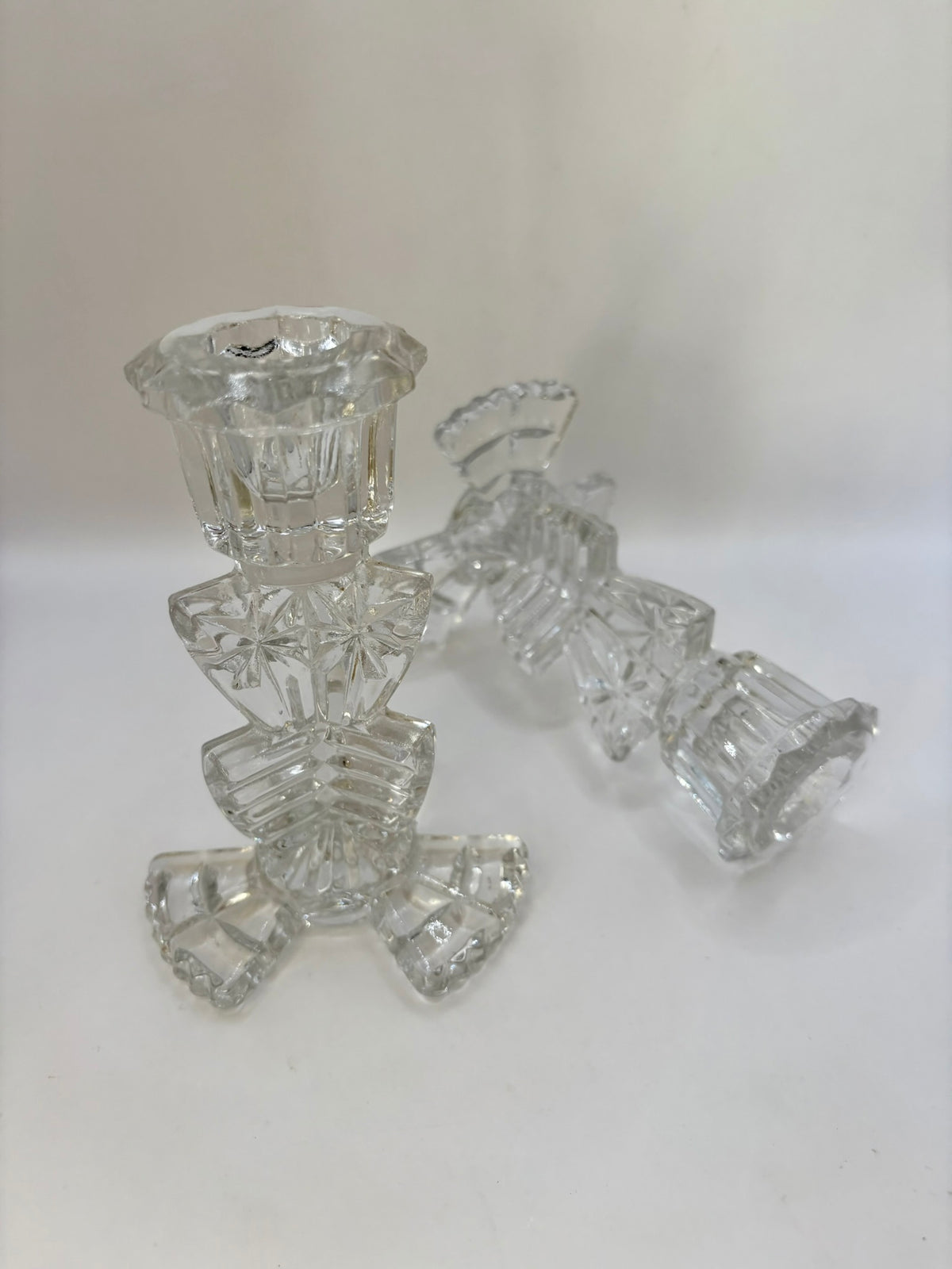 Clear glass candle holder on a white background