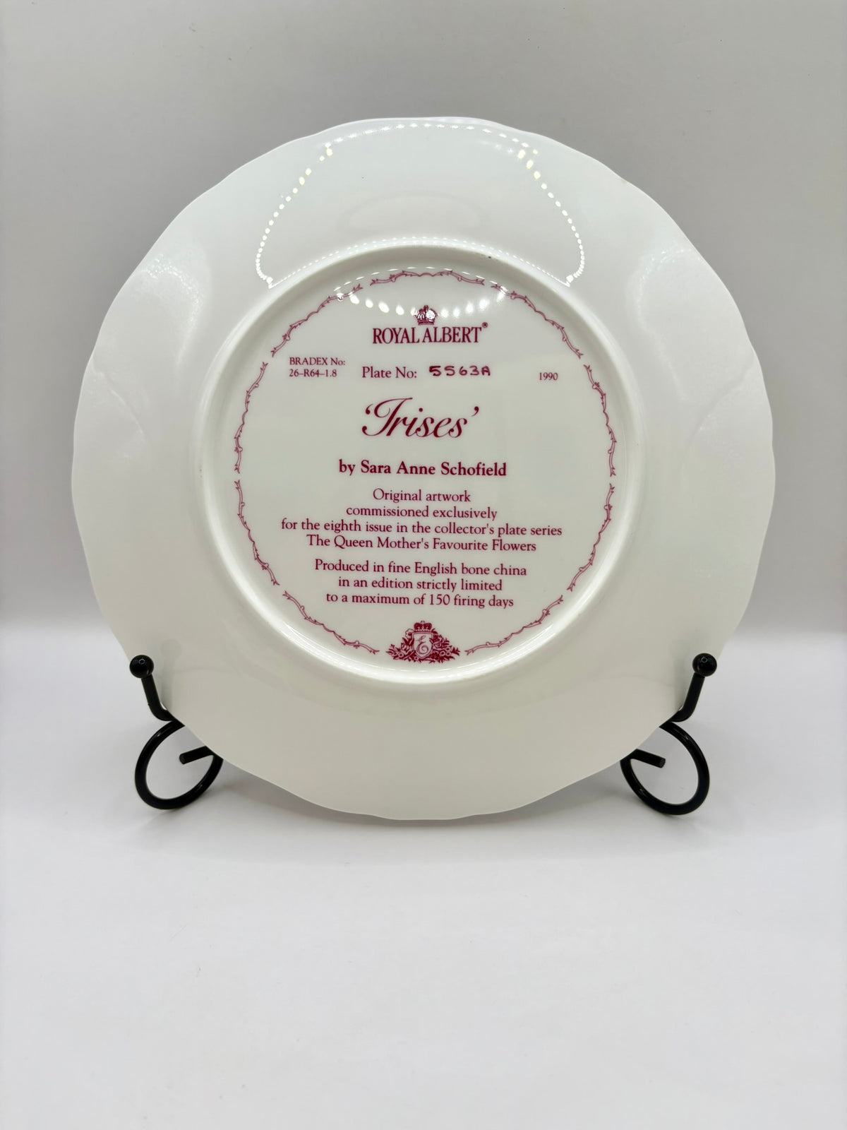 White decorative plate with text on a gray background