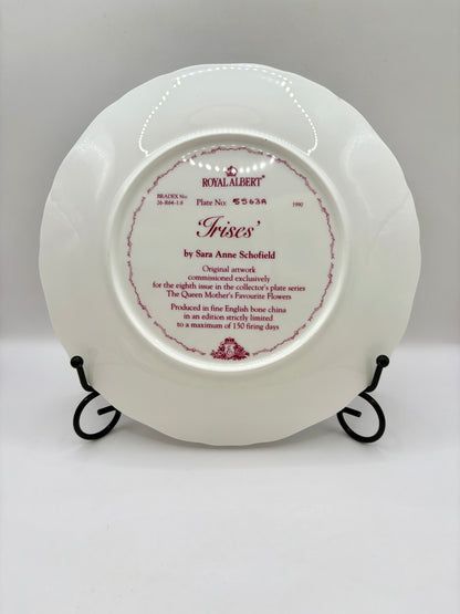 White decorative plate with text on a gray background