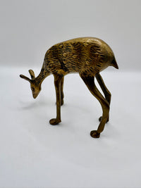 Solid brass doe figurine grazing vintage collectible sculpture
