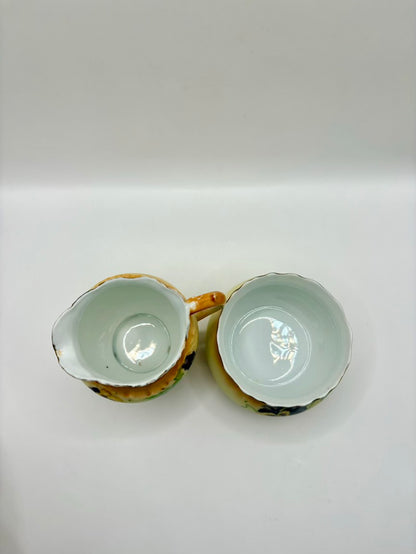 Two ceramic bowls with a decorative edge on a white background