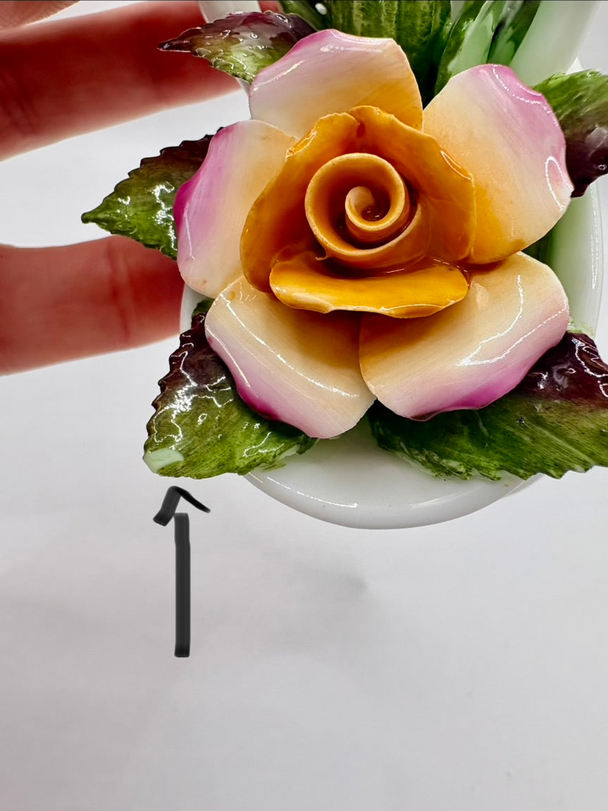 Decorative flower made of food on a white plate with a blurred background