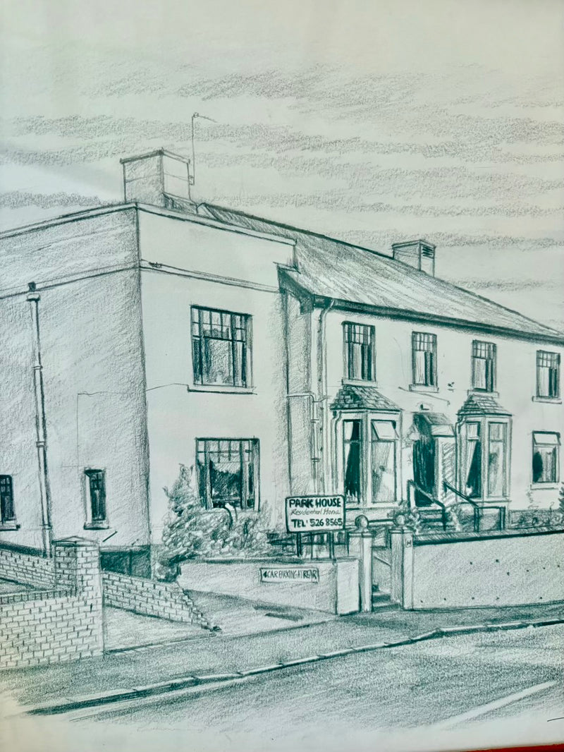 Pencil drawing of a two-story building with a sign on the front