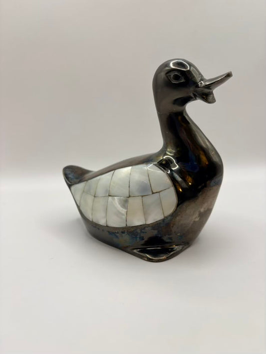 Decorative duck sculpture with mosaic pattern on a white background