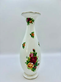 White vase with floral patterns on a white background