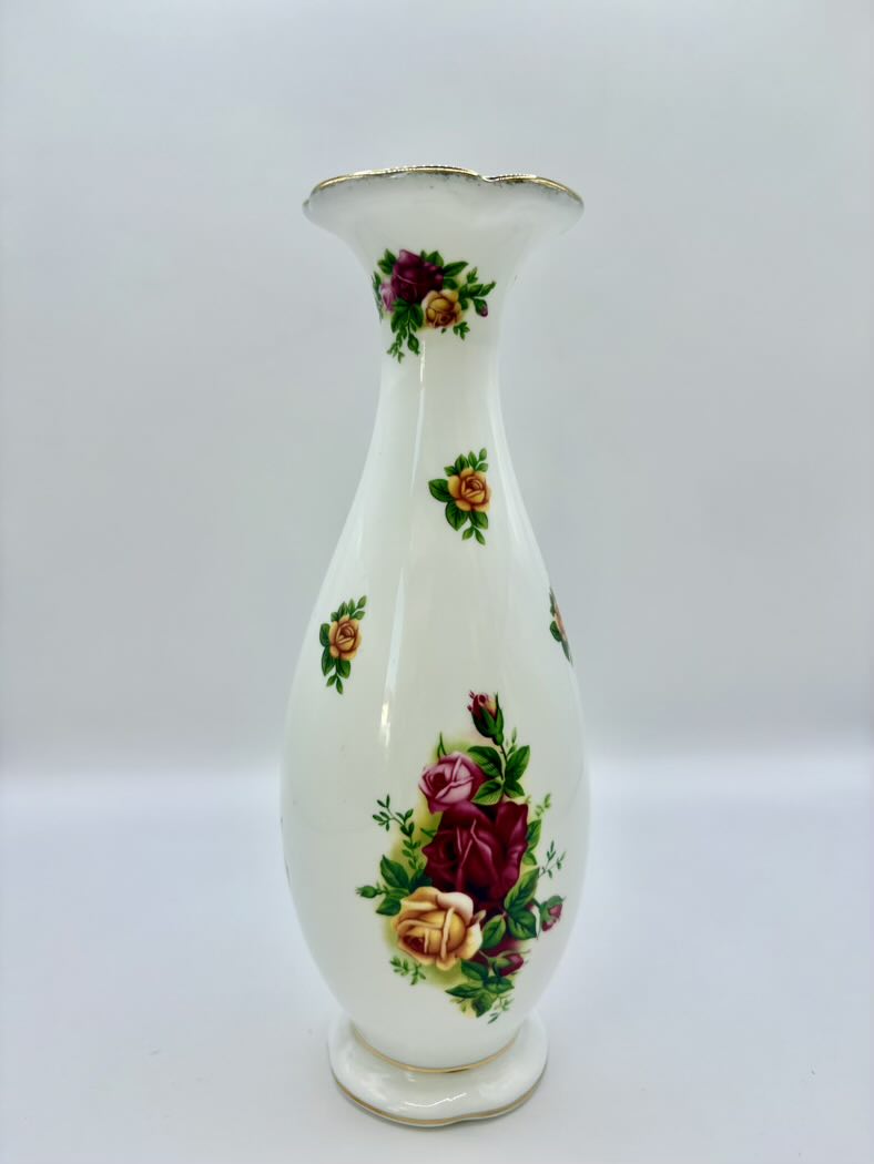 White vase with floral patterns on a white background