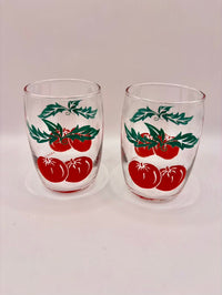 Pair of French tomato juice glasses front view